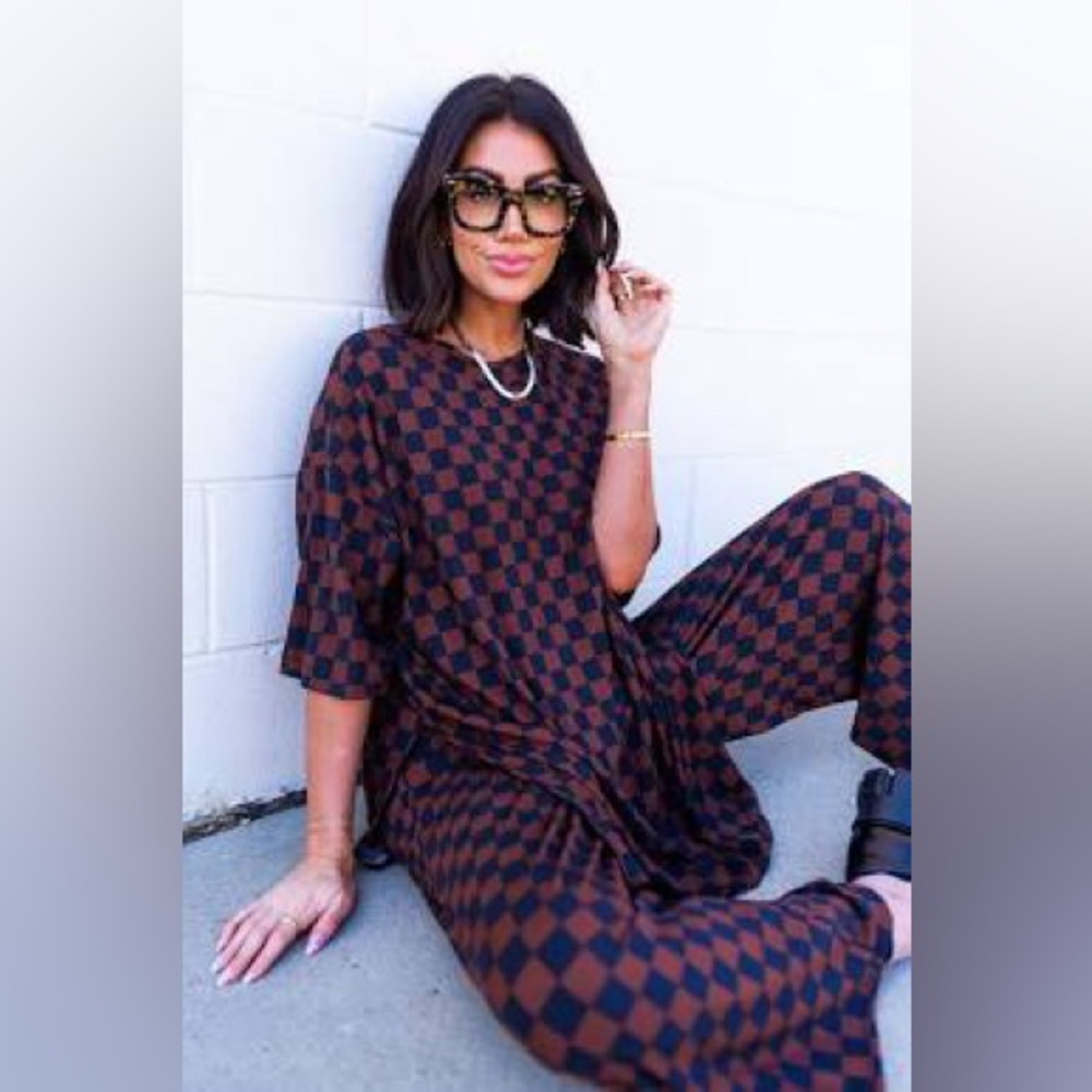 Dressed in Lala Ribbed Playsuit in Black Mocha, Size L!